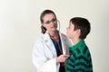 Doctor assessing patient by stethoscope Royalty Free Stock Photo