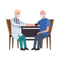 Doctor attending old man in table