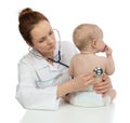Doctor auscultating child baby patient heart with stethoscope Royalty Free Stock Photo