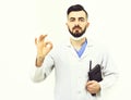 Doctor with beard holds notebook for history of illness