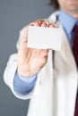 Doctor with business card Royalty Free Stock Photo