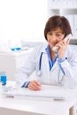 Doctor calling on phone Royalty Free Stock Photo