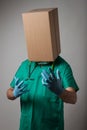 Doctor with cardboard box head Royalty Free Stock Photo