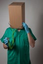 Doctor with cardboard box head Royalty Free Stock Photo