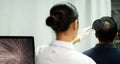 Doctor check Hair fall loss on middle age man head as glabrous baldness Royalty Free Stock Photo
