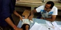 government hospital doctor checking baby boy health on table at district Katni hospital in India