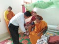 Doctor checked up monks with STITHISCOPE