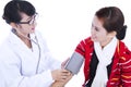 Doctor checking blood pressure of patient Royalty Free Stock Photo