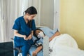 Doctor checking blood pressure of patient Royalty Free Stock Photo