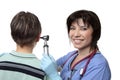 Doctor checking ears with otoscope Royalty Free Stock Photo