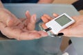 Doctor checking glucose level in diabetic patient Royalty Free Stock Photo