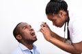 Doctor Checking Man`s Sore Throat Royalty Free Stock Photo