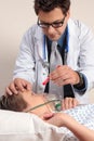 Doctor checking patient eyes Royalty Free Stock Photo