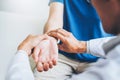 Doctor checking pulse for patients Health care in hospital Royalty Free Stock Photo