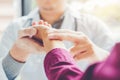 Doctor checking pulse for patients Health care in hospital Royalty Free Stock Photo