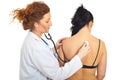 Doctor checkup back woman Royalty Free Stock Photo