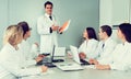 Speech by the head physician at a meeting in the office with employees Royalty Free Stock Photo