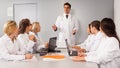 Doctor chief speech at meeting Royalty Free Stock Photo