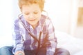 Doctor and child patient. Little boy play with stethoscope while physician communicate with him. hildren`s therapy and Royalty Free Stock Photo