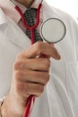 Doctor with clipboard's hand holding stethoscope