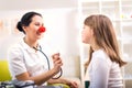 Doctor with clown nose and happy child patient Royalty Free Stock Photo