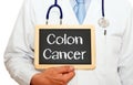 Doctor with a colon cancer sign Royalty Free Stock Photo