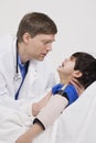 Doctor comforting little boy patient Royalty Free Stock Photo