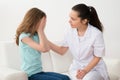 Doctor Comforting Patient Crying