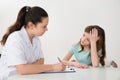 Doctor Comforting Patient At Table