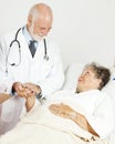 Doctor Comforting Senior Patient Royalty Free Stock Photo