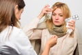 Doctor communicate with patient recommend treatment. Doctor ask patient about symptoms. Flu and cold treatment. Girl in