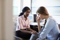 Doctor In Consultation With Depressed Female Patient Royalty Free Stock Photo