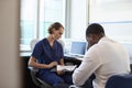 Doctor In Consultation With Depressed Male Patient Royalty Free Stock Photo