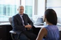 Doctor In Consultation With Female Patient In Office Royalty Free Stock Photo