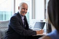 Doctor In Consultation With Female Patient In Office Royalty Free Stock Photo