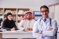 The doctor consulting arab family at hospital