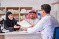 The doctor consulting arab family at hospital