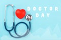 Doctor's Day concept, flat lay top view, stethoscope with red hearts diagnosis of heart disease Royalty Free Stock Photo