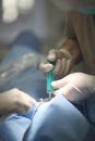 Doctor dentist injects an anesthetic drug