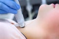 Doctor examining patient child girl thyroid gland using ultrasound scanner. Royalty Free Stock Photo