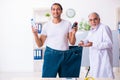 Doctor dietician and happy patient wearing large trousers
