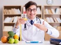 Doctor in dieting concept with fruits and vegetables