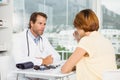 Doctor in discussion with patient at medical office