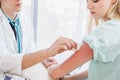 A doctor disinfects on arm`s skin before injection Royalty Free Stock Photo