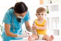 Doctor does injection child vaccination baby Royalty Free Stock Photo