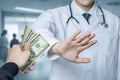 Doctor does not accept bribes in the form of cash