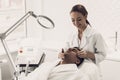 Doctor Doing Dermatology Procedure in Clinic. Royalty Free Stock Photo