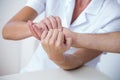 Doctor doing hand massage Royalty Free Stock Photo