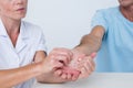 Doctor doing hand massage Royalty Free Stock Photo