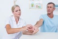 Doctor doing hand massage Royalty Free Stock Photo